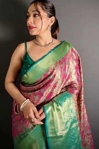 rani pink color kanjivaram silk blend zari woven saree with blouse