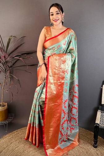 sea green color kanjivaram silk blend zari woven saree with blouse