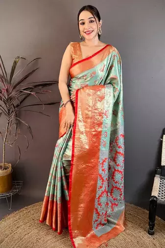 sea green color kanjivaram silk blend zari woven saree with blouse