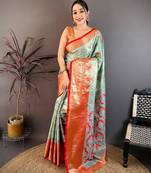 sea green color kanjivaram silk blend zari woven saree with blouse