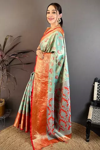 sea green color kanjivaram silk blend zari woven saree with blouse