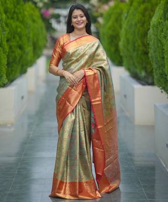 pista green color kanjivaram silk blend zari weaving saree with blouse  1