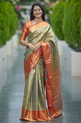 pista green color kanjivaram silk blend zari weaving saree with blouse 
