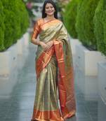pista green color kanjivaram silk blend zari weaving saree with blouse 