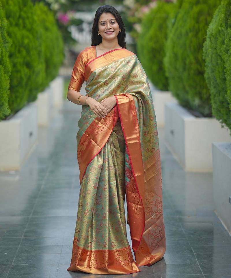 pista green color kanjivaram silk blend zari weaving saree with blouse 