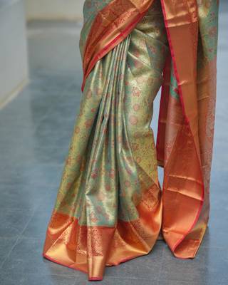 pista green color kanjivaram silk blend zari weaving saree with blouse  4