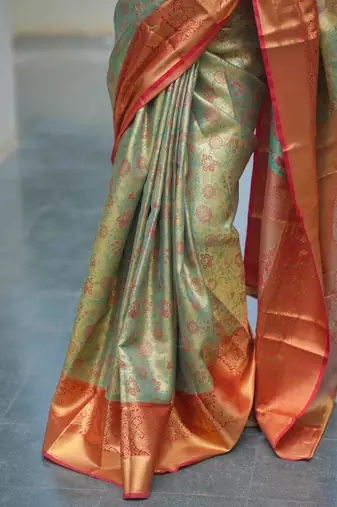 pista green color kanjivaram silk blend zari weaving saree with blouse 