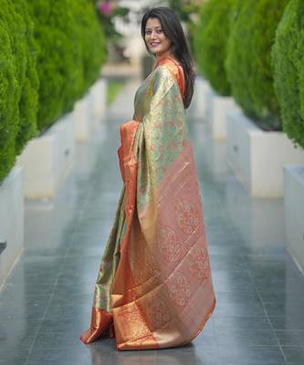 pista green color kanjivaram silk blend zari weaving saree with blouse  5