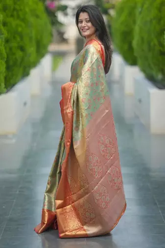 pista green color kanjivaram silk blend zari weaving saree with blouse 