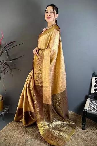 beige color kanchipuram silk blend zari woven sarees