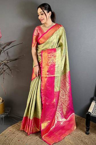 pista green color kanchipuram silk blend zari woven sarees