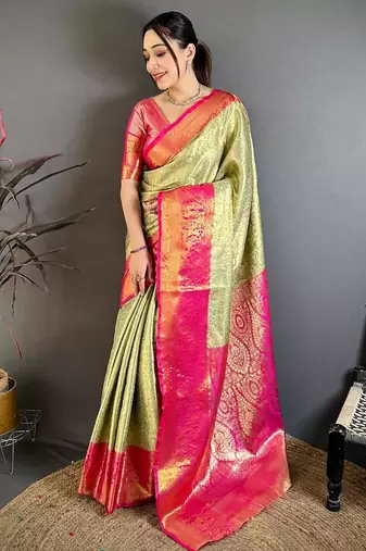 pista green color kanchipuram silk blend zari woven sarees