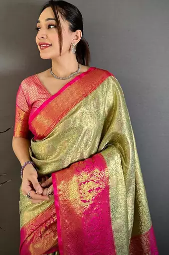 pista green color kanchipuram silk blend zari woven sarees