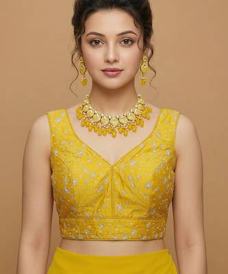 Yellow embroidered v neck designer saree blouse 1