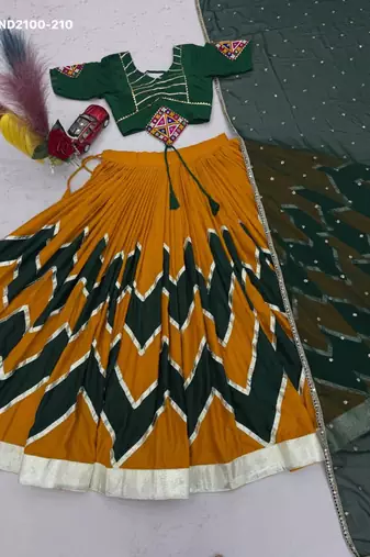 yellow printed cotton-poly mirror work circular lehenga choli