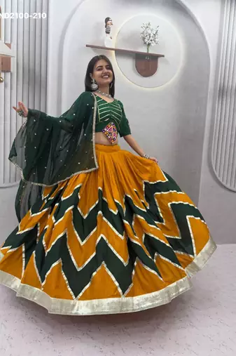 yellow printed cotton-poly mirror work circular lehenga choli