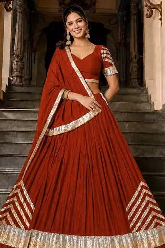 Navratri Orange Silk Blend Plain Lehenga Choli