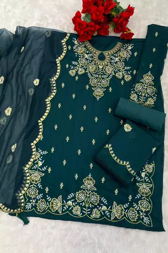 Green vichitra suit with embroidered viscose thread jari & sequin work