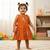 Orange south indian traditional pattu pavadai tapeta silk embrodairy frock dress