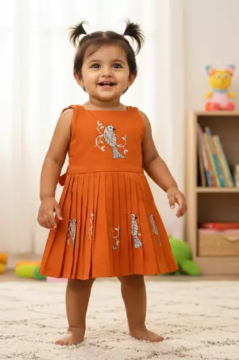 Orange south indian traditional pattu pavadai tapeta silk embrodairy frock dress