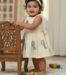 Cream south indian traditional pattu pavadai tapeta silk embrodairy frock dress