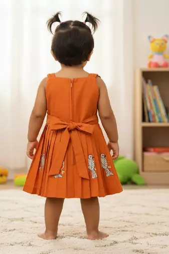 Orange south indian traditional pattu pavadai tapeta silk embrodairy frock dress