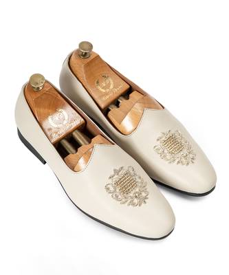 Cream off white solid leather slipons 1