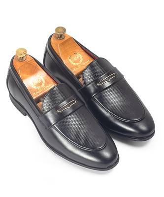 Black synthetic textured slipons 1
