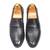 Black synthetic textured slipons