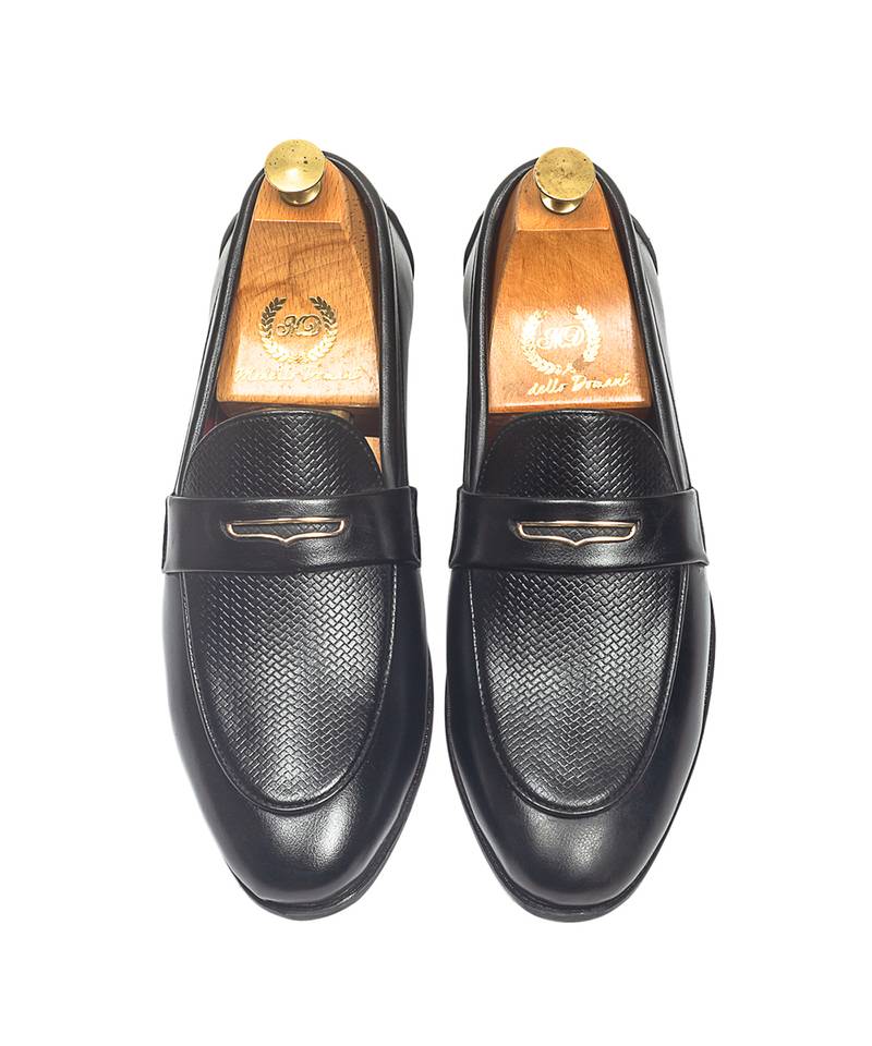 Black synthetic textured slipons