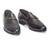 Dark brown synthetic textured slipons