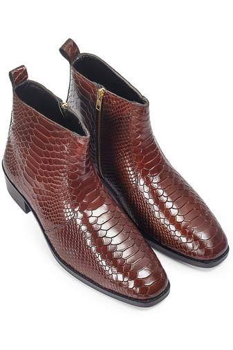 Brown serpente leather boots