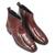 Brown serpente leather boots