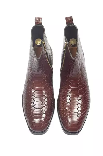 Brown serpente leather boots