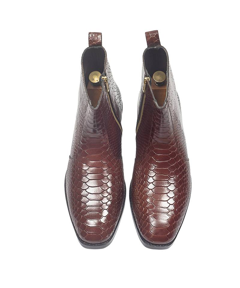 Brown serpente leather boots