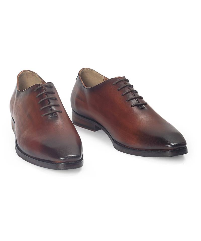 Tan brown leather wholecut shoes
