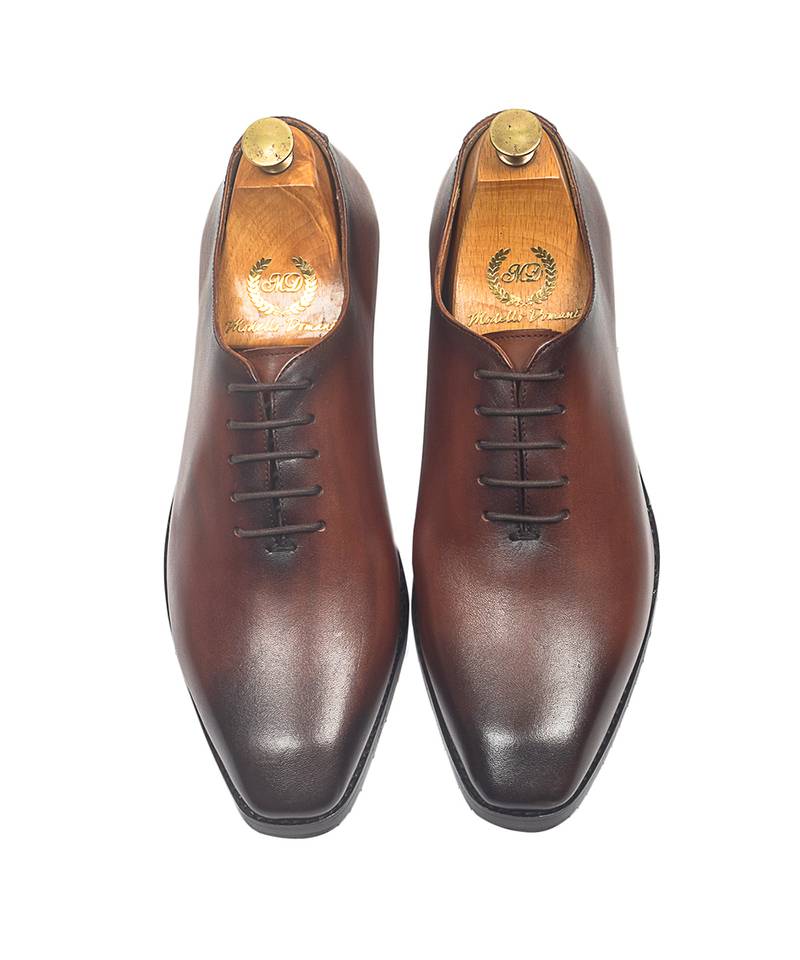 Tan brown leather wholecut shoes
