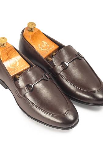 Brown synthetic buckle slipons