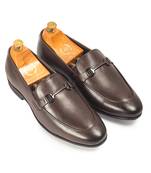Brown synthetic buckle slipons
