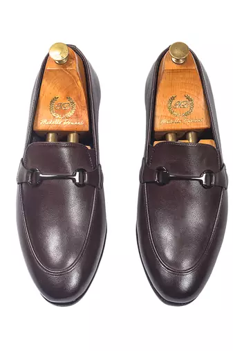 Brown synthetic buckle slipons
