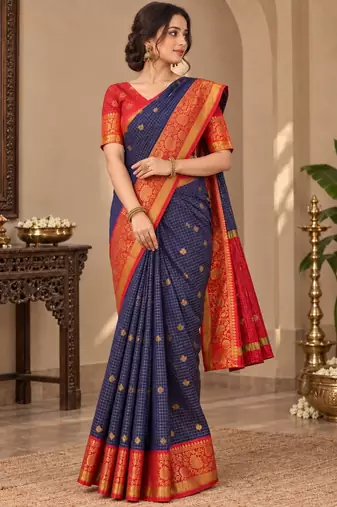 festive silk blend saree featuring a rich woven border paired with a matching blouse