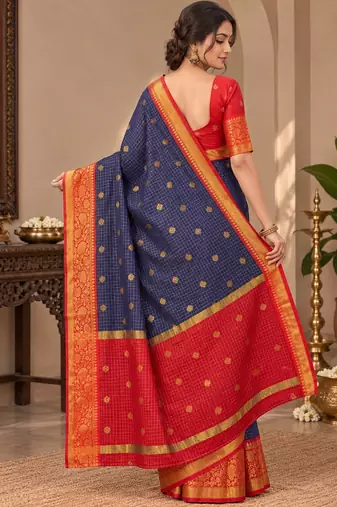 festive silk blend saree featuring a rich woven border paired with a matching blouse