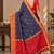 festive silk blend saree featuring a rich woven border paired with a matching blouse