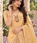 traditional silk blend saree adorned with intricate zari weaving and a beautifully matching blouse