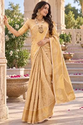 traditional silk blend saree adorned with intricate zari weaving and a beautifully matching blouse 2