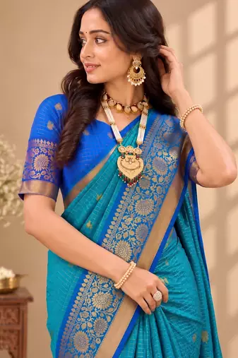 festive silk blend saree crafted with elegant woven borders and a beautifully matching blouse