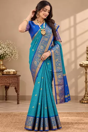 festive silk blend saree crafted with elegant woven borders and a beautifully matching blouse
