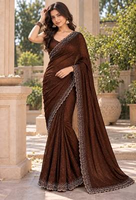 Partywear fandy satin saree featuring jarkan work for a rich and glamorous look 4