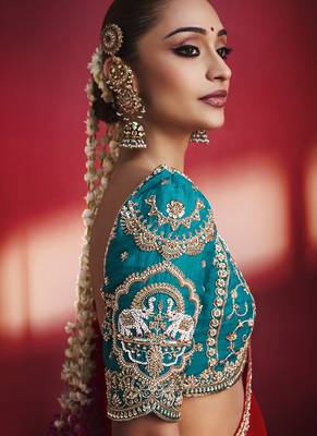 crimson red silk blend saree with teal blue embroidered blouse & zari border 4