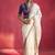 white silk blend saree with purple embroidered blouse & zari border